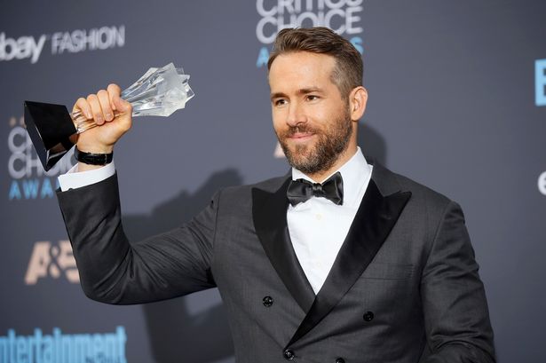 Ryan Reynolds poses with his award during the 22nd Annual Critics Choice Awards in Santa Monica